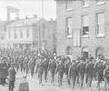 Procession of soldiers along Poole Quay