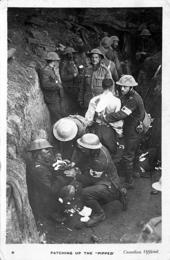 Vintage black and white photo of RAMC medics in trench